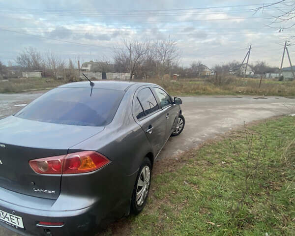 Серый Мицубиси Лансер, объемом двигателя 1.5 л и пробегом 255 тыс. км за 6500 $, фото 14 на Automoto.ua