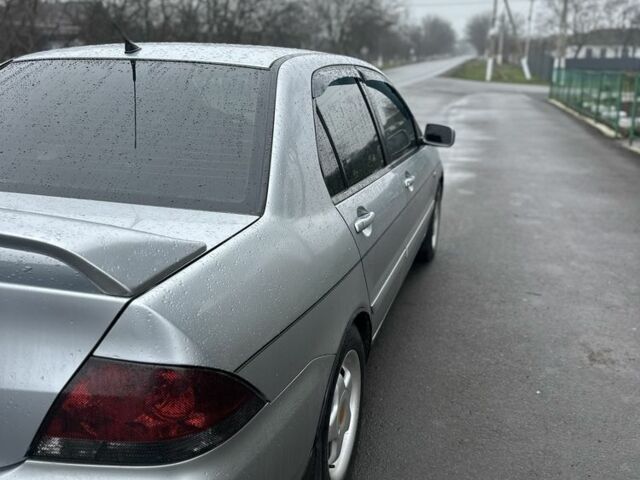 Сірий Міцубісі Lancer, об'ємом двигуна 1.6 л та пробігом 222 тис. км за 4300 $, фото 5 на Automoto.ua
