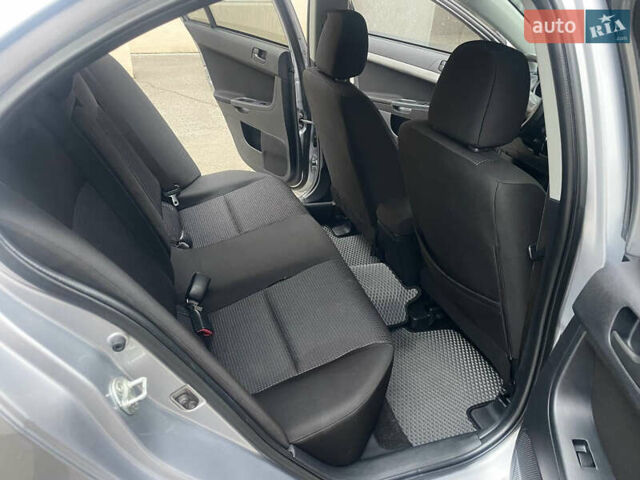 Сірий Міцубісі Lancer, об'ємом двигуна 1.5 л та пробігом 177 тис. км за 5999 $, фото 10 на Automoto.ua