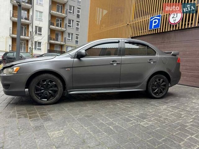 Сірий Міцубісі Lancer, об'ємом двигуна 1.5 л та пробігом 240 тис. км за 3900 $, фото 1 на Automoto.ua