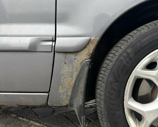 Серый Мицубиси Лансер, объемом двигателя 1.6 л и пробегом 222 тыс. км за 5200 $, фото 3 на Automoto.ua