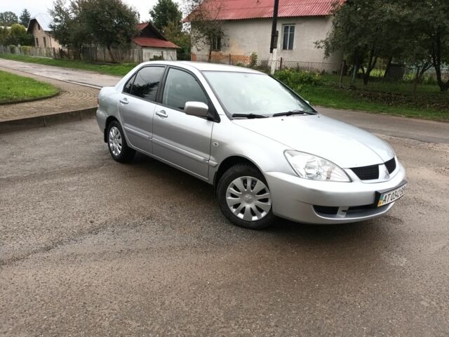 Сірий Міцубісі Lancer, об'ємом двигуна 1.6 л та пробігом 224 тис. км за 3100 $, фото 2 на Automoto.ua