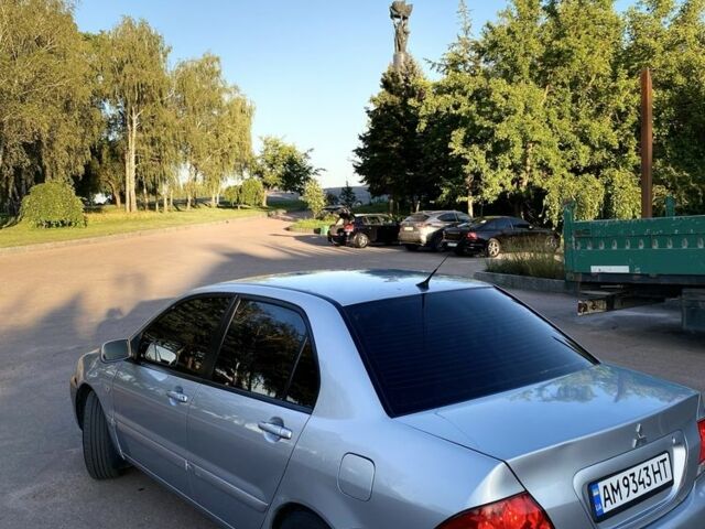 Сірий Міцубісі Lancer, об'ємом двигуна 1.6 л та пробігом 211 тис. км за 3899 $, фото 7 на Automoto.ua