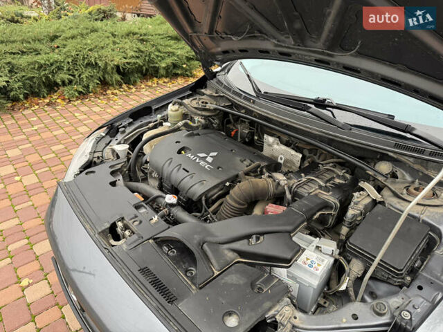 Сірий Міцубісі Lancer, об'ємом двигуна 2 л та пробігом 92 тис. км за 8200 $, фото 46 на Automoto.ua