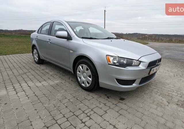 Серый Мицубиси Лансер, объемом двигателя 1.5 л и пробегом 147 тыс. км за 6700 $, фото 2 на Automoto.ua