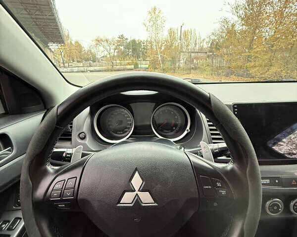 Сірий Міцубісі Lancer, об'ємом двигуна 2 л та пробігом 253 тис. км за 8700 $, фото 25 на Automoto.ua