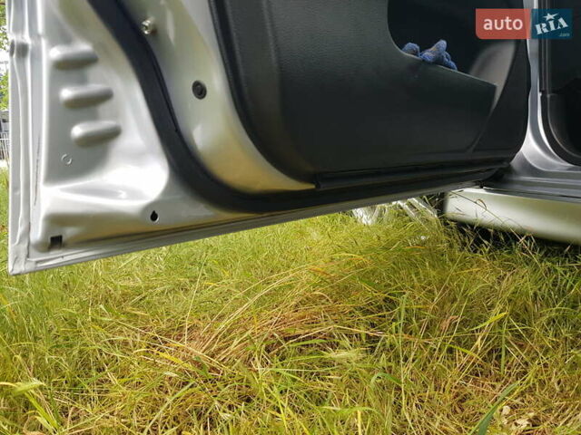 Серый Мицубиси Лансер, объемом двигателя 2 л и пробегом 150 тыс. км за 5650 $, фото 14 на Automoto.ua