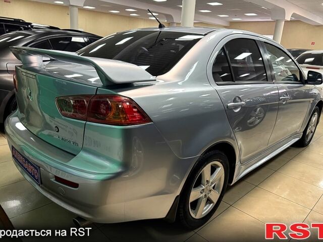 Серый Мицубиси Лансер, объемом двигателя 1.5 л и пробегом 241 тыс. км за 6400 $, фото 3 на Automoto.ua