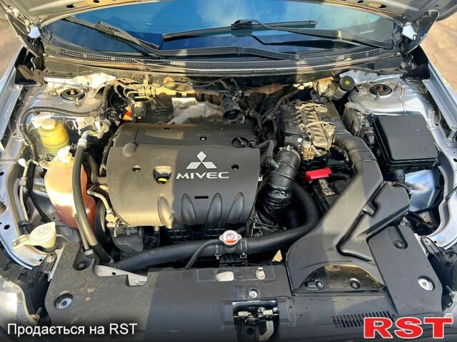 Сірий Міцубісі Lancer, об'ємом двигуна 2 л та пробігом 195 тис. км за 5999 $, фото 13 на Automoto.ua
