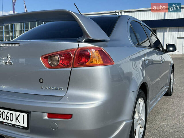 Сірий Міцубісі Lancer, об'ємом двигуна 2 л та пробігом 237 тис. км за 7200 $, фото 21 на Automoto.ua