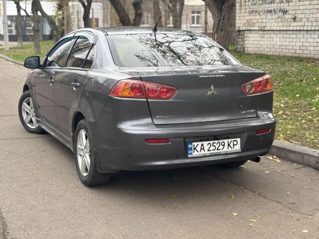 Серый Мицубиси Лансер, объемом двигателя 2 л и пробегом 240 тыс. км за 5450 $, фото 2 на Automoto.ua