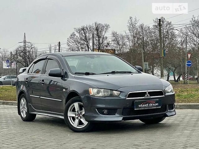 Сірий Міцубісі Lancer, об'ємом двигуна 1.5 л та пробігом 235 тис. км за 6399 $, фото 2 на Automoto.ua