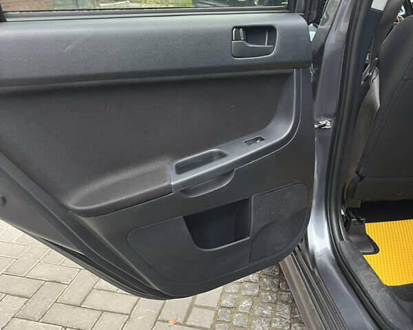 Сірий Міцубісі Lancer, об'ємом двигуна 2 л та пробігом 131 тис. км за 4899 $, фото 12 на Automoto.ua