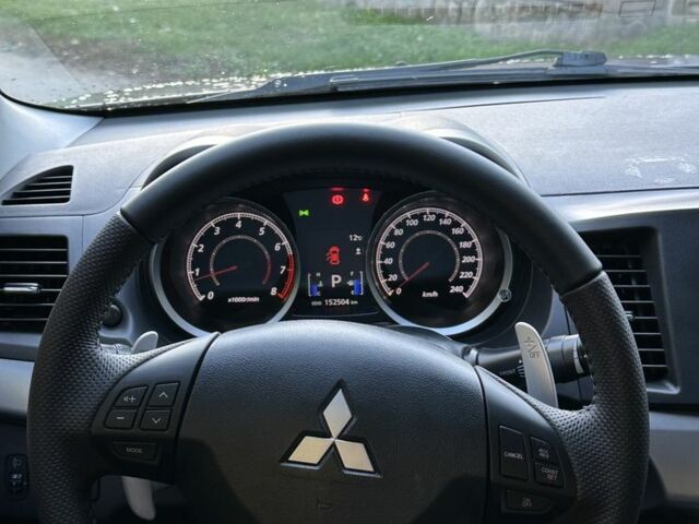 Серый Мицубиси Лансер, объемом двигателя 2 л и пробегом 153 тыс. км за 7500 $, фото 2 на Automoto.ua