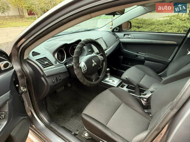 Сірий Міцубісі Lancer, об'ємом двигуна 2 л та пробігом 92 тис. км за 8200 $, фото 11 на Automoto.ua