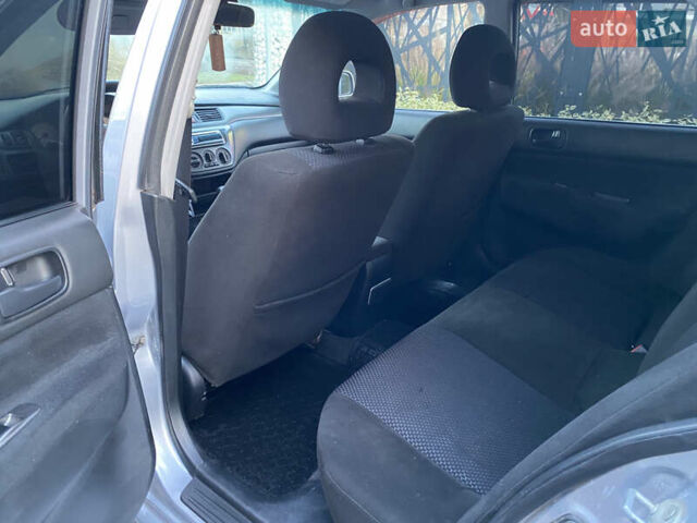 Серый Мицубиси Лансер, объемом двигателя 1.6 л и пробегом 203 тыс. км за 5200 $, фото 7 на Automoto.ua