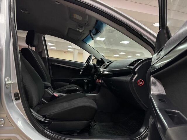 Серый Мицубиси Лансер, объемом двигателя 2 л и пробегом 172 тыс. км за 6300 $, фото 8 на Automoto.ua