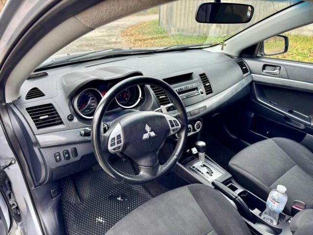 Серый Мицубиси Лансер, объемом двигателя 2 л и пробегом 225 тыс. км за 6890 $, фото 9 на Automoto.ua