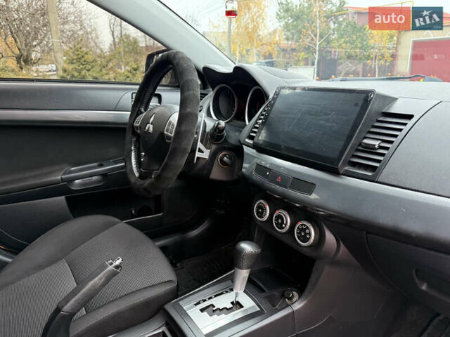 Сірий Міцубісі Lancer, об'ємом двигуна 2 л та пробігом 92 тис. км за 8200 $, фото 31 на Automoto.ua