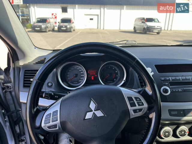 Сірий Міцубісі Lancer, об'ємом двигуна 2 л та пробігом 237 тис. км за 7200 $, фото 30 на Automoto.ua