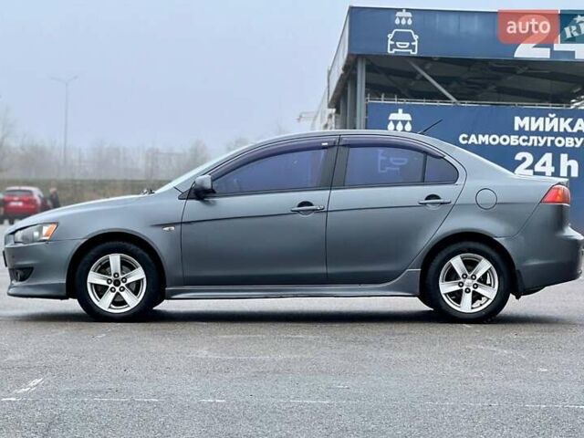 Серый Мицубиси Лансер, объемом двигателя 2 л и пробегом 203 тыс. км за 4999 $, фото 2 на Automoto.ua