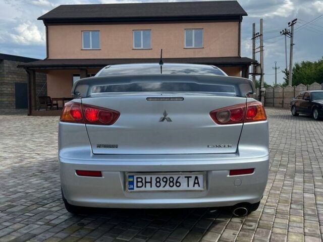 Сірий Міцубісі Lancer, об'ємом двигуна 2 л та пробігом 238 тис. км за 6400 $, фото 4 на Automoto.ua