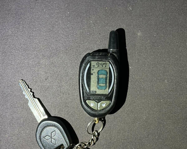 Сірий Міцубісі Lancer, об'ємом двигуна 1.59 л та пробігом 219 тис. км за 4500 $, фото 20 на Automoto.ua