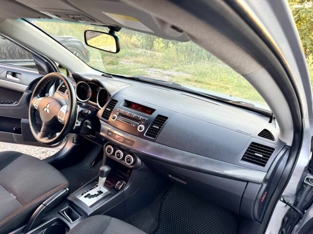 Сірий Міцубісі Lancer, об'ємом двигуна 2 л та пробігом 223 тис. км за 6890 $, фото 18 на Automoto.ua
