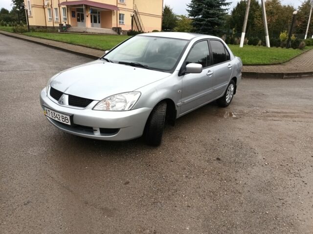 Сірий Міцубісі Lancer, об'ємом двигуна 1.6 л та пробігом 224 тис. км за 3100 $, фото 1 на Automoto.ua