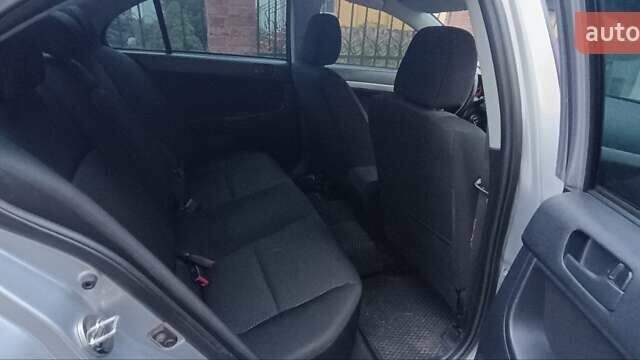 Серый Мицубиси Лансер, объемом двигателя 1.5 л и пробегом 230 тыс. км за 6300 $, фото 12 на Automoto.ua