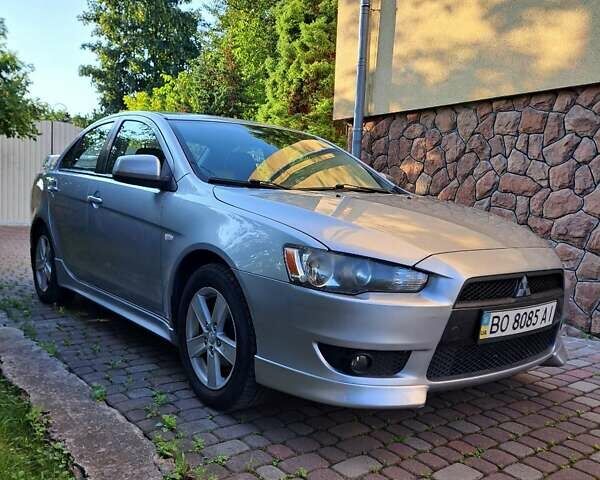 Сірий Міцубісі Lancer, об'ємом двигуна 2 л та пробігом 207 тис. км за 6550 $, фото 1 на Automoto.ua