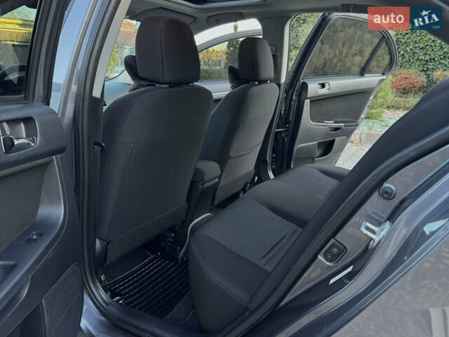 Сірий Міцубісі Lancer, об'ємом двигуна 2 л та пробігом 92 тис. км за 9800 $, фото 80 на Automoto.ua