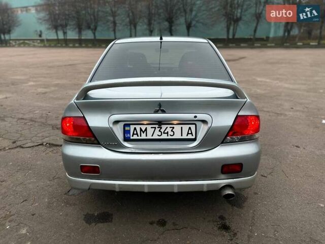 Сірий Міцубісі Lancer, об'ємом двигуна 1.6 л та пробігом 254 тис. км за 3800 $, фото 5 на Automoto.ua