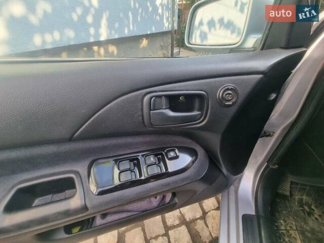 Сірий Міцубісі Lancer, об'ємом двигуна 1.6 л та пробігом 290 тис. км за 3850 $, фото 4 на Automoto.ua