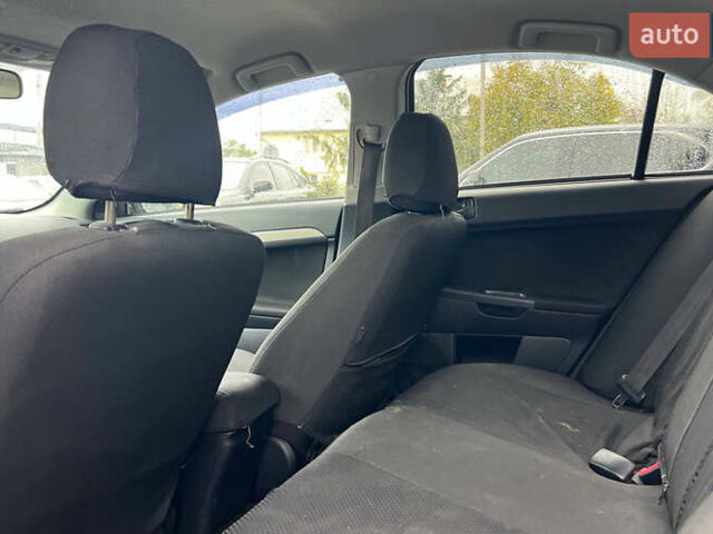 Серый Мицубиси Лансер, объемом двигателя 1.5 л и пробегом 239 тыс. км за 6000 $, фото 19 на Automoto.ua