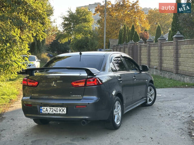 Серый Мицубиси Лансер, объемом двигателя 2 л и пробегом 153 тыс. км за 7500 $, фото 1 на Automoto.ua