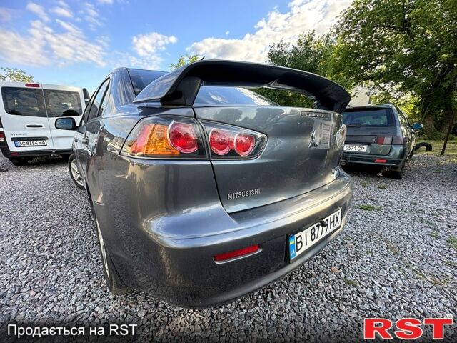Сірий Міцубісі Lancer, об'ємом двигуна 2 л та пробігом 208 тис. км за 5899 $, фото 2 на Automoto.ua