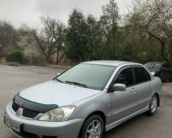 Мицубиси Лансер 2008 в Владимир-Волынский на Automoto.ua Серый Мицубиси Лансер, объемом двигателя 1.4 л и пробегом 268 тыс. км за 3700 $, фото 3 на Automoto.ua