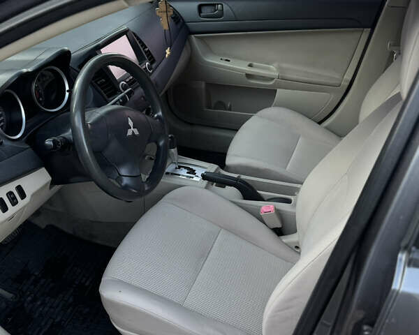 Сірий Міцубісі Lancer, об'ємом двигуна 2 л та пробігом 292 тис. км за 5500 $, фото 5 на Automoto.ua