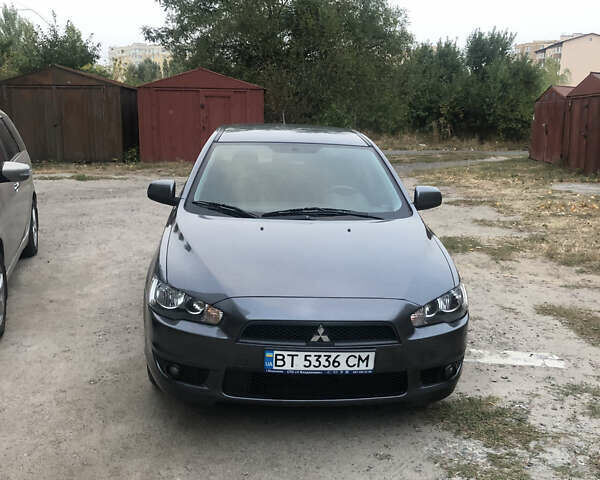 Сірий Міцубісі Lancer, об'ємом двигуна 2 л та пробігом 187 тис. км за 8000 $, фото 12 на Automoto.ua