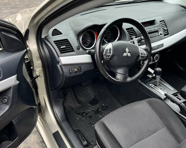 Сірий Міцубісі Lancer, об'ємом двигуна 2 л та пробігом 230 тис. км за 6800 $, фото 19 на Automoto.ua