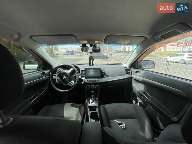 Серый Мицубиси Лансер, объемом двигателя 2 л и пробегом 265 тыс. км за 5500 $, фото 8 на Automoto.ua