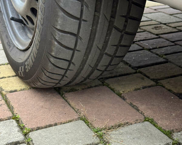 Сірий Міцубісі Lancer, об'ємом двигуна 1.6 л та пробігом 221 тис. км за 3650 $, фото 21 на Automoto.ua