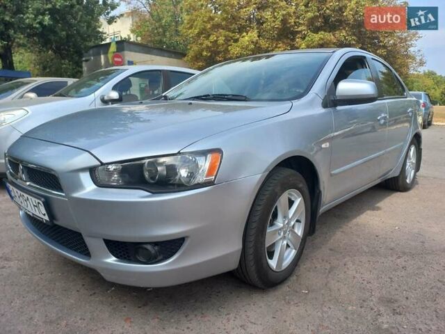 Серый Мицубиси Лансер, объемом двигателя 2 л и пробегом 103 тыс. км за 7700 $, фото 4 на Automoto.ua