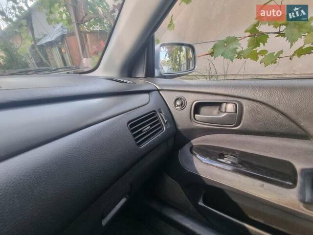 Сірий Міцубісі Lancer, об'ємом двигуна 1.6 л та пробігом 290 тис. км за 3850 $, фото 2 на Automoto.ua