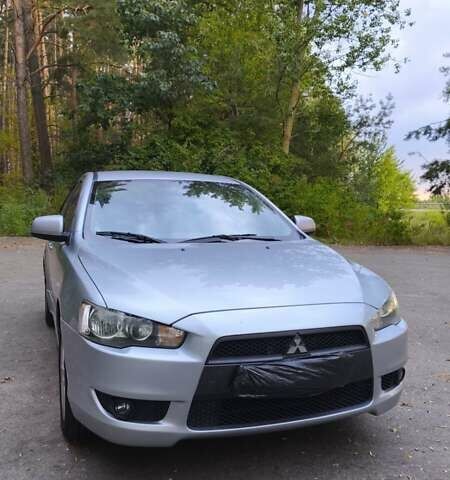 Міцубісі Lancer 2008 у Києві на Automoto.ua Сірий Міцубісі Lancer, об'ємом двигуна 2 л та пробігом 175 тис. км за 8200 $, фото 22 на Automoto.ua