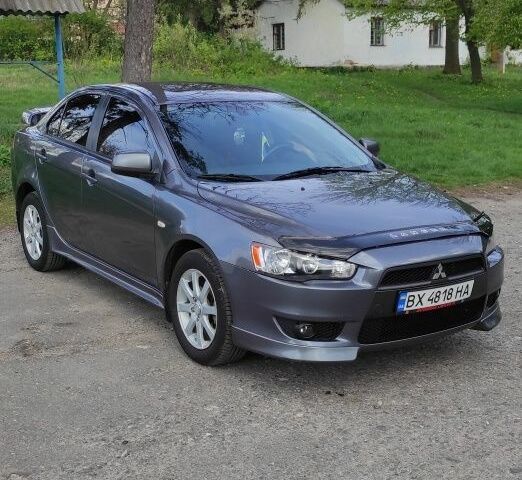 Сірий Міцубісі Lancer, об'ємом двигуна 2 л та пробігом 153 тис. км за 7499 $, фото 1 на Automoto.ua