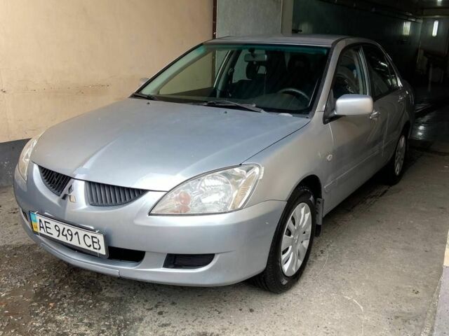 Сірий Міцубісі Lancer, об'ємом двигуна 1.6 л та пробігом 196 тис. км за 4700 $, фото 3 на Automoto.ua