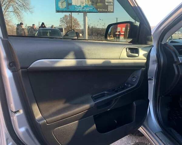 Серый Мицубиси Лансер, объемом двигателя 1.5 л и пробегом 160 тыс. км за 5300 $, фото 6 на Automoto.ua