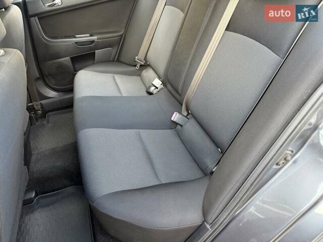 Серый Мицубиси Лансер, объемом двигателя 2 л и пробегом 230 тыс. км за 6900 $, фото 32 на Automoto.ua